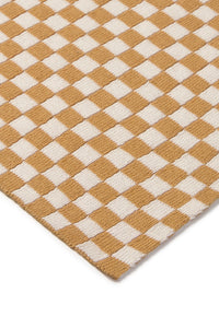 Checkered throw blanket with honey yellow and white squares 