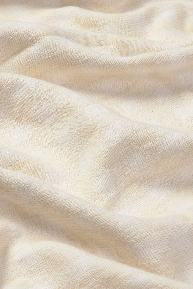 Close-up of a ivory checkered blanket