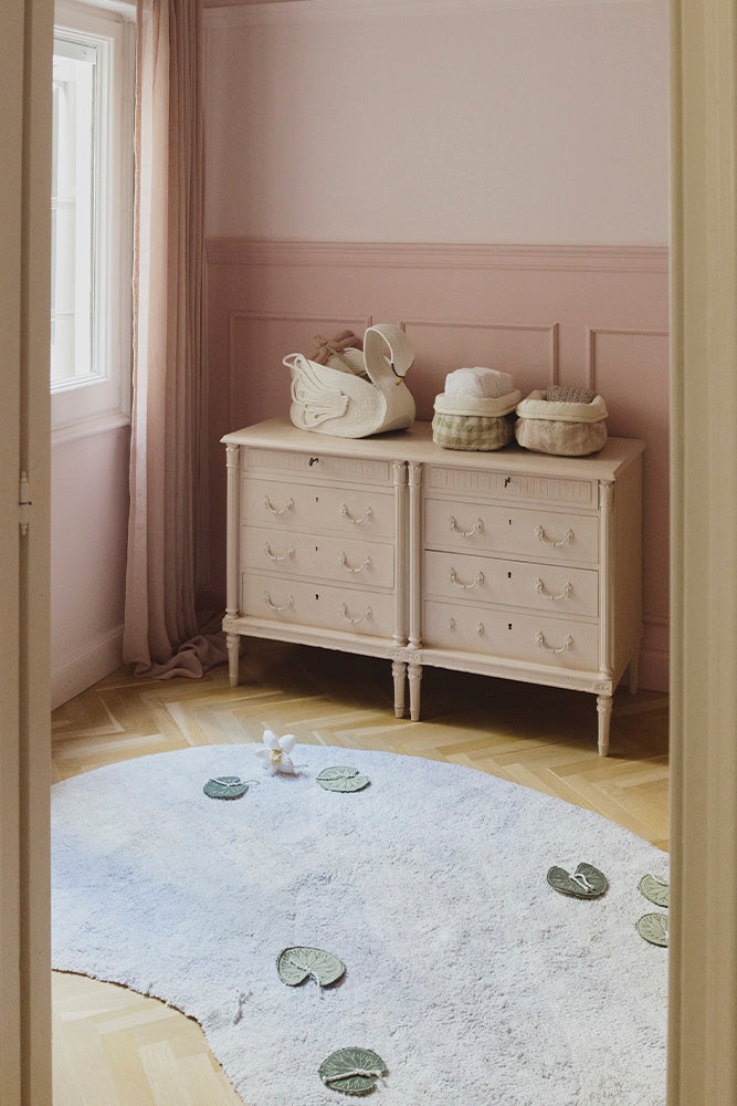Decorative Storage Baskets on Dresser with Lake Shaped Rug