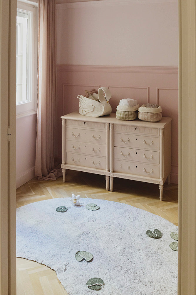 Decorative Storage Baskets on Dresser with Lake Shaped Rug