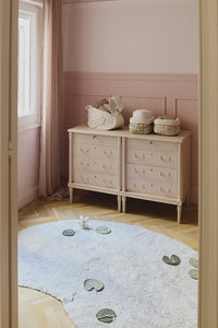 Decorative Storage Baskets on Dresser with Lake Shaped Rug
