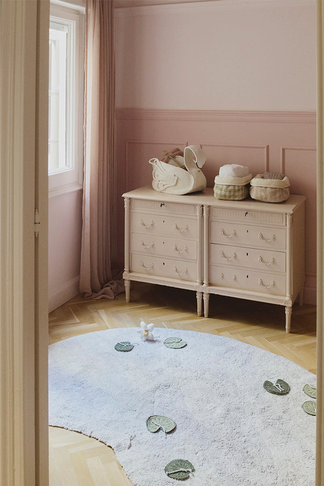 Decorative Storage Baskets on Dresser with Lake Shaped Rug