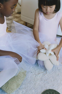 Girls Playing with Water Lillies on Rug