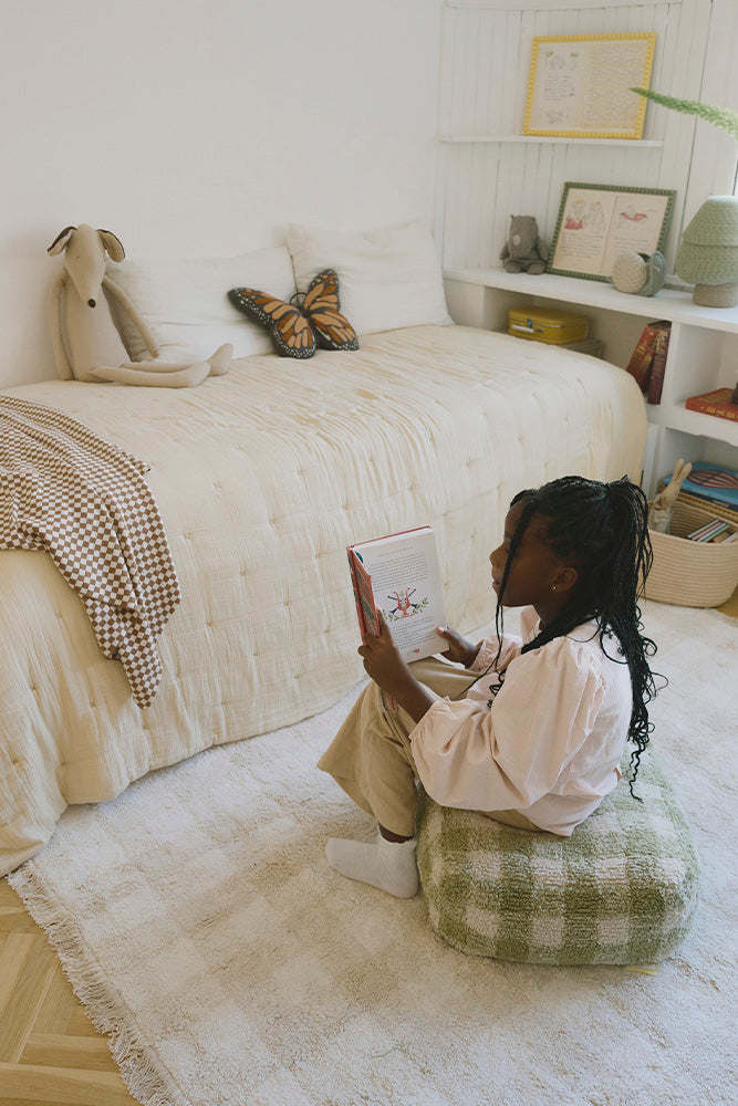 Girls Room with Ivory Checkered Rug with Fringe and Green Checked Pouf