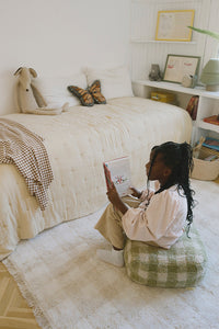 Girls Room with Ivory Checkered Rug with Fringe and Green Checked Pouf