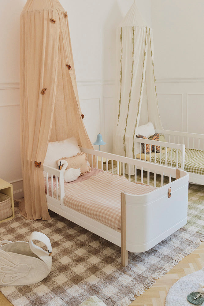Maroonish Brown Checkered Rug in Girl's Room with Toddler Beds