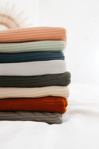 Rust Ribbed Stretch Swaddle Blanket