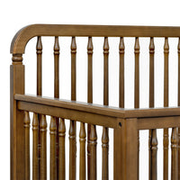 Liberty 4-in-1 Convertible Spindle Crib in Natural Walnut