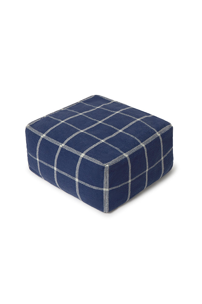Square pouf ottoman with navy blue grid pattern 
