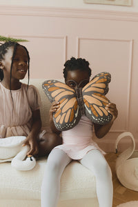 Two Children with Black and Orange Butterfly Pillow
