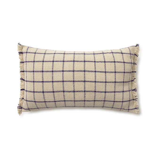 Checkered pillow with fringed edges 