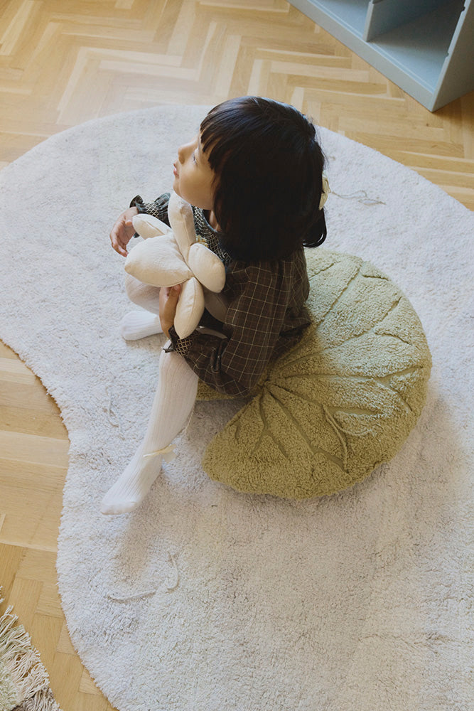 Little Girl Sitting on Water Lily Pad Floor Cushion