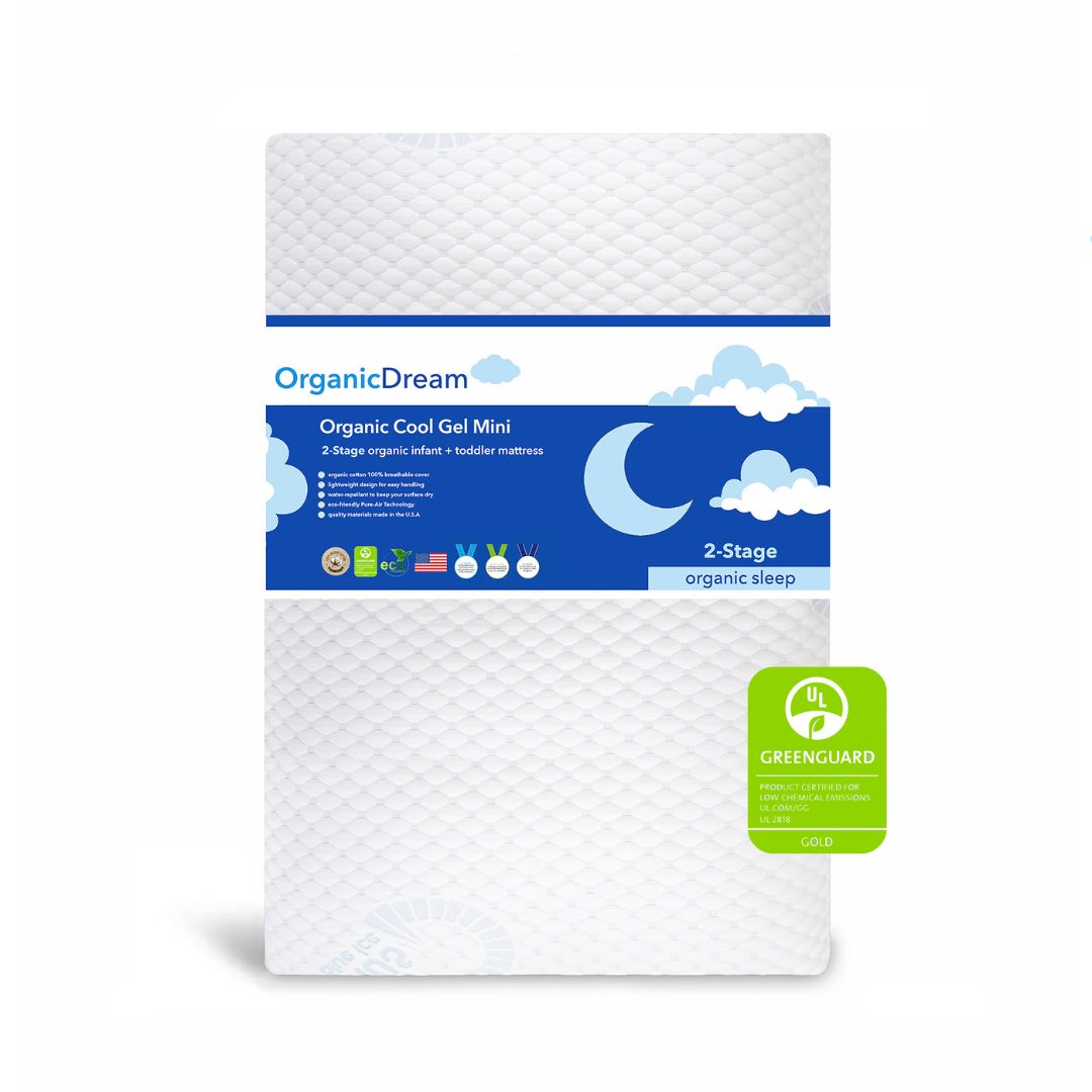 Packaged crib mattress with branding and certification logos, indicating organic and eco-friendly materials.