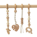 Natural Wooden Play Gym with Macrame Toys - Project Nursery