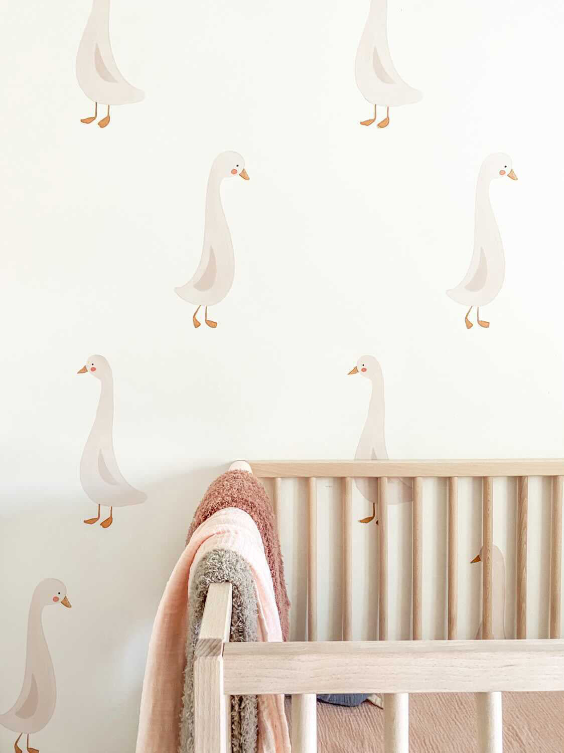 goose decals next to a crib