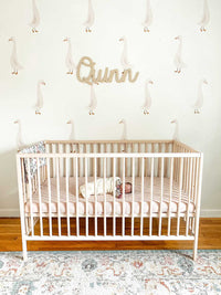 goose decals view next to a crib in home setting