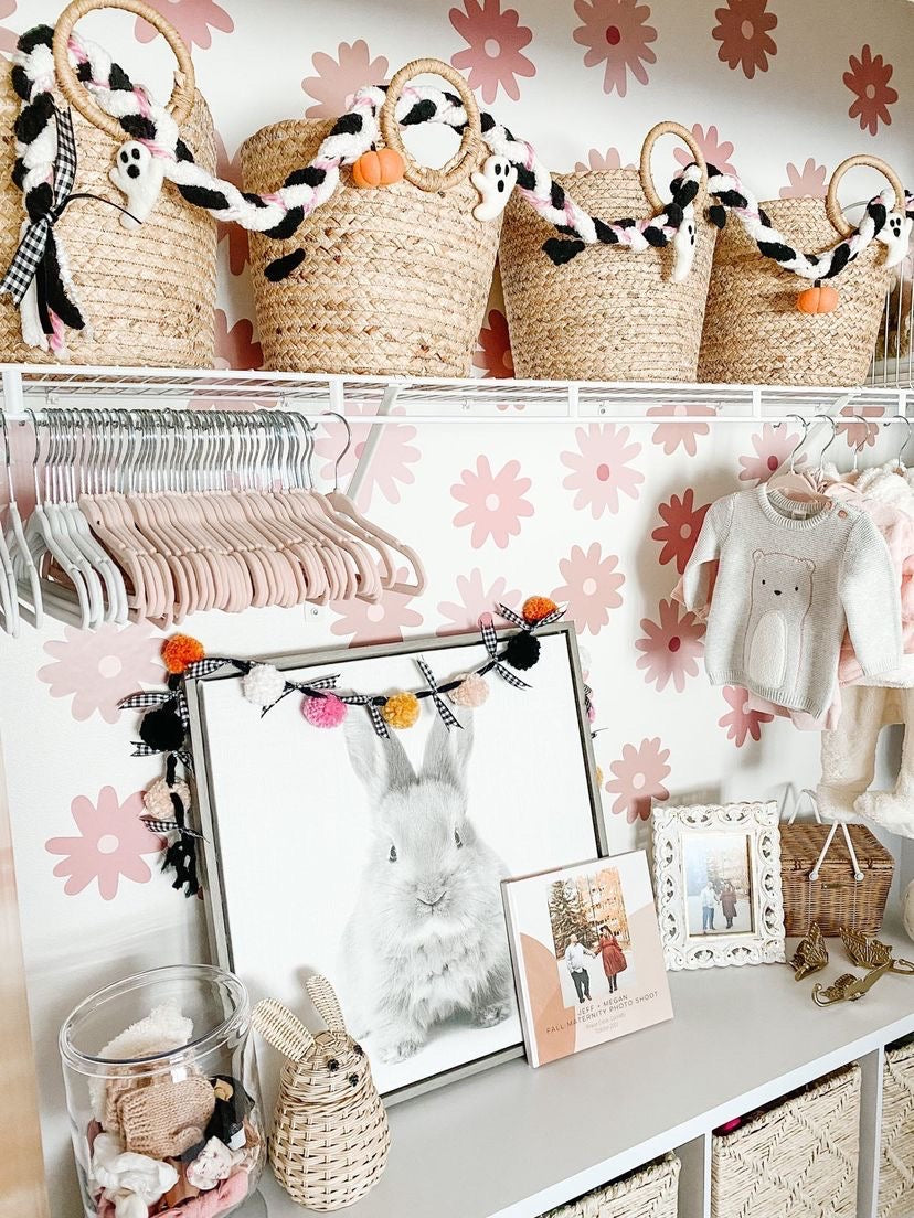 kids bedroom closet with pink floral wall decal background
